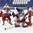 POPRAD, SLOVAKIA - APRIL 20: Czech Republic's Radim Salda #21 reaches for a loose puck while his teammates Jan Kern #12, Filip Chytil #20, Jakub Skarek #1 and Finland's Kristian Vesalainen #10 look on during quarterfinal round action at the 2017 IIHF Ice Hockey U18 World Championship. (Photo by Andrea Cardin/HHOF-IIHF Images)